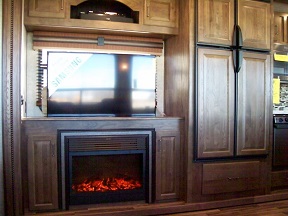 Big TV, fireplace, and refrigerator