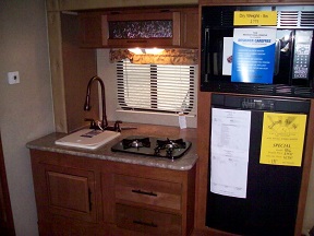 refrigerator, microwave, stove, sink