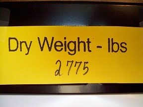 Two-thousand, seven-hundred, seventy-five pounds, dry weight