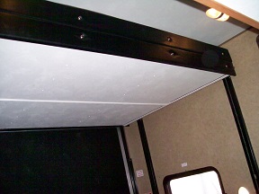 Electric bed lift in rear cargo area
