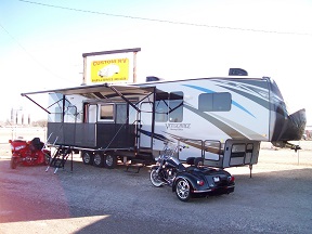 Touring Edition Vengeance toy hauler fifth wheel with two patio decks