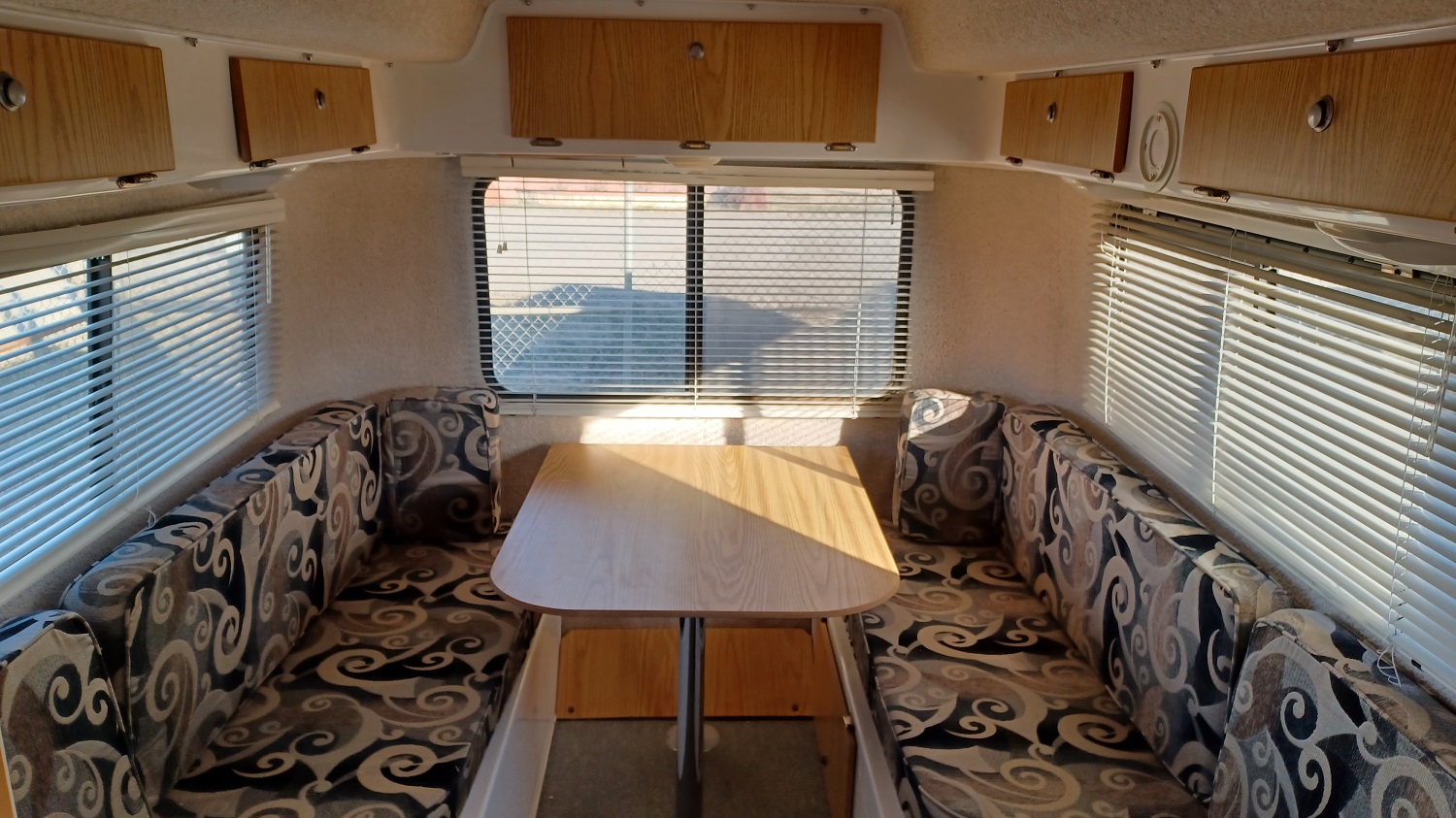 Casita bed made up into a dinette