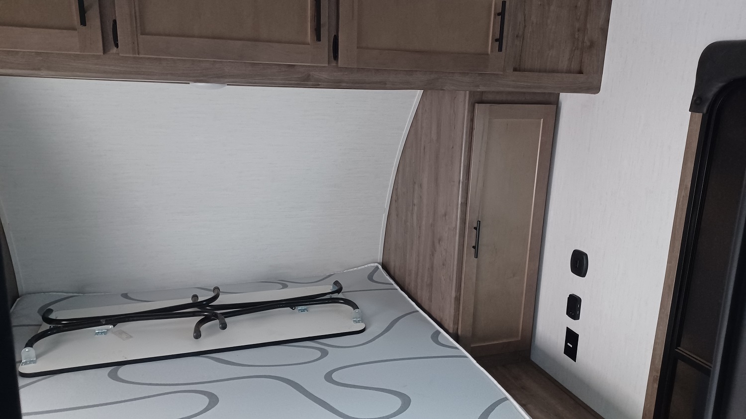 there is a table on the bed in this picture but you can put the table wherever you want