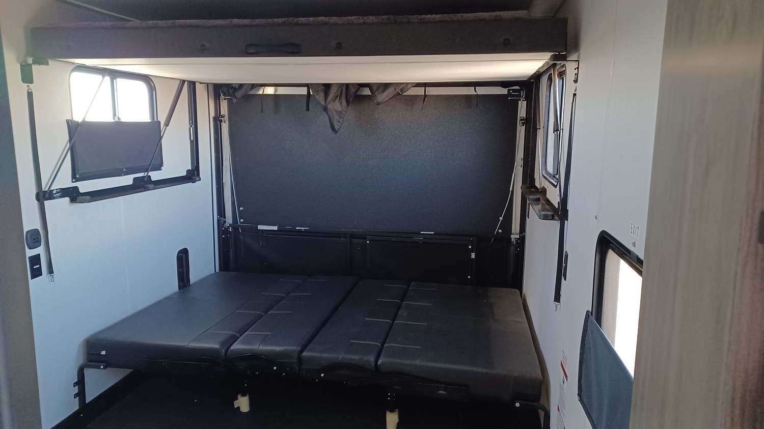 the toy box measures 12 feet 7 inches with the patio rail installed, or 12 feet inches without the patio rail